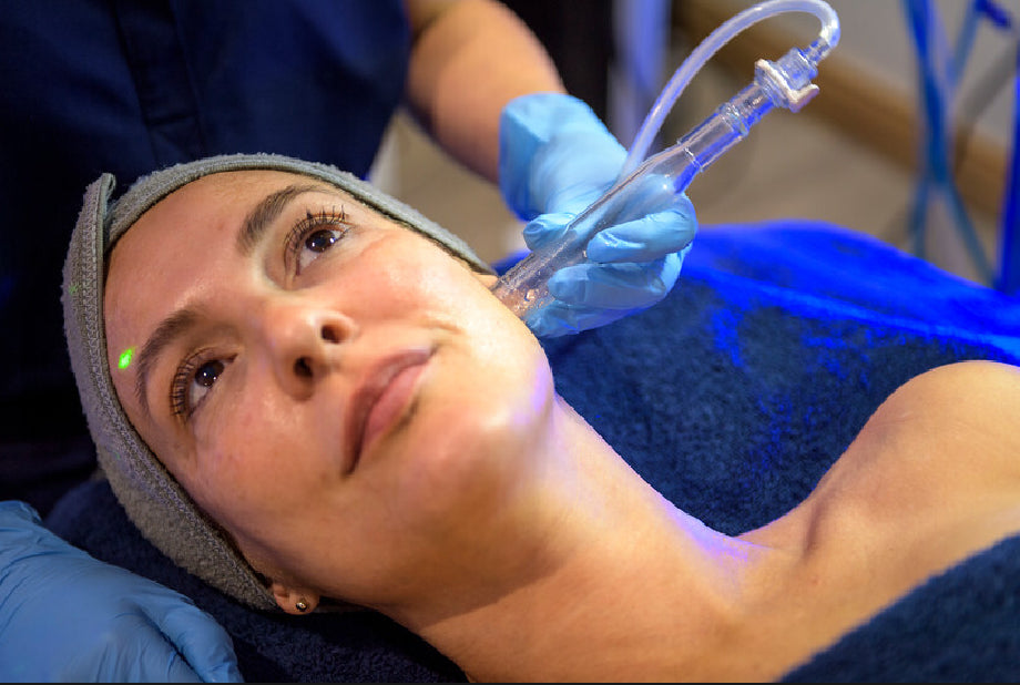 This image shows a woman receiving our Platinum HydraFacial treatment for anti-aging, skin rejuvenation, skin tightening and sun damage. Treatments available to clients in Bromley, Beckenham, Petts Wood, Orpington, Sevenoaks and across Kent and Greater London.